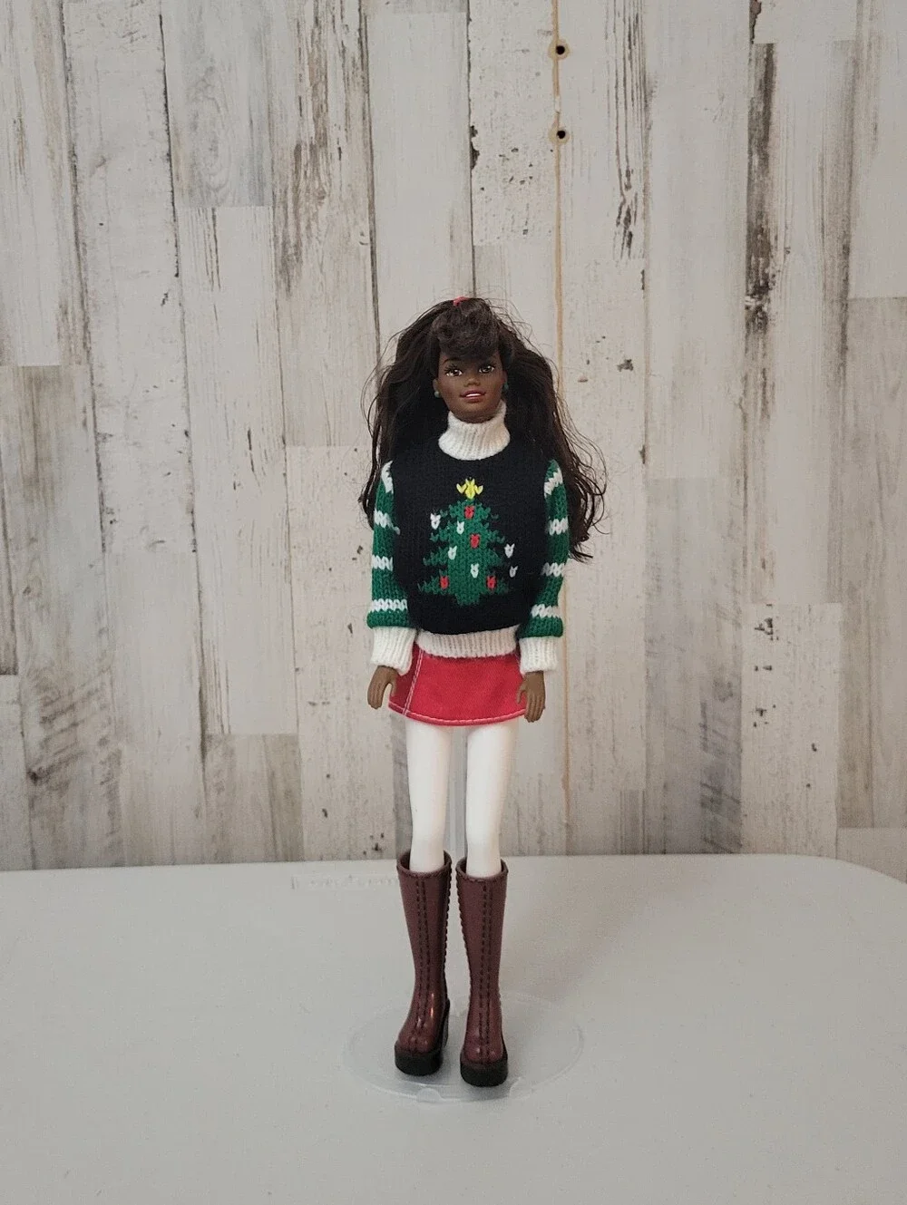 Brunette Doll with Green Stud Earrings and White Turtleneck